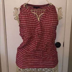 Red sleeveless shirt